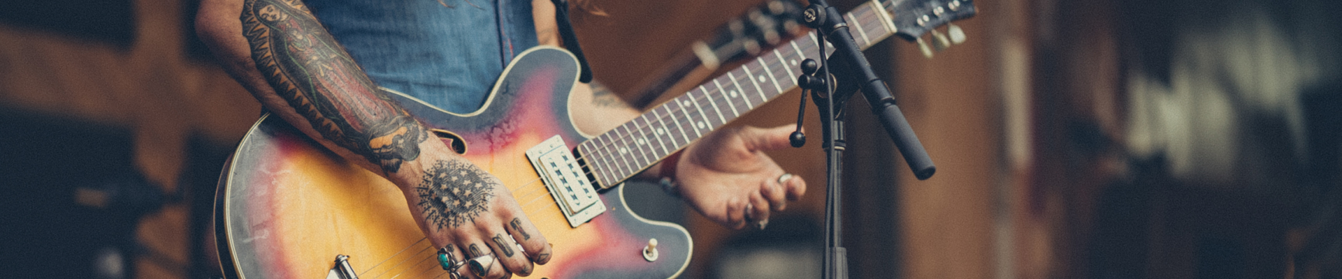 Guy playing guitar